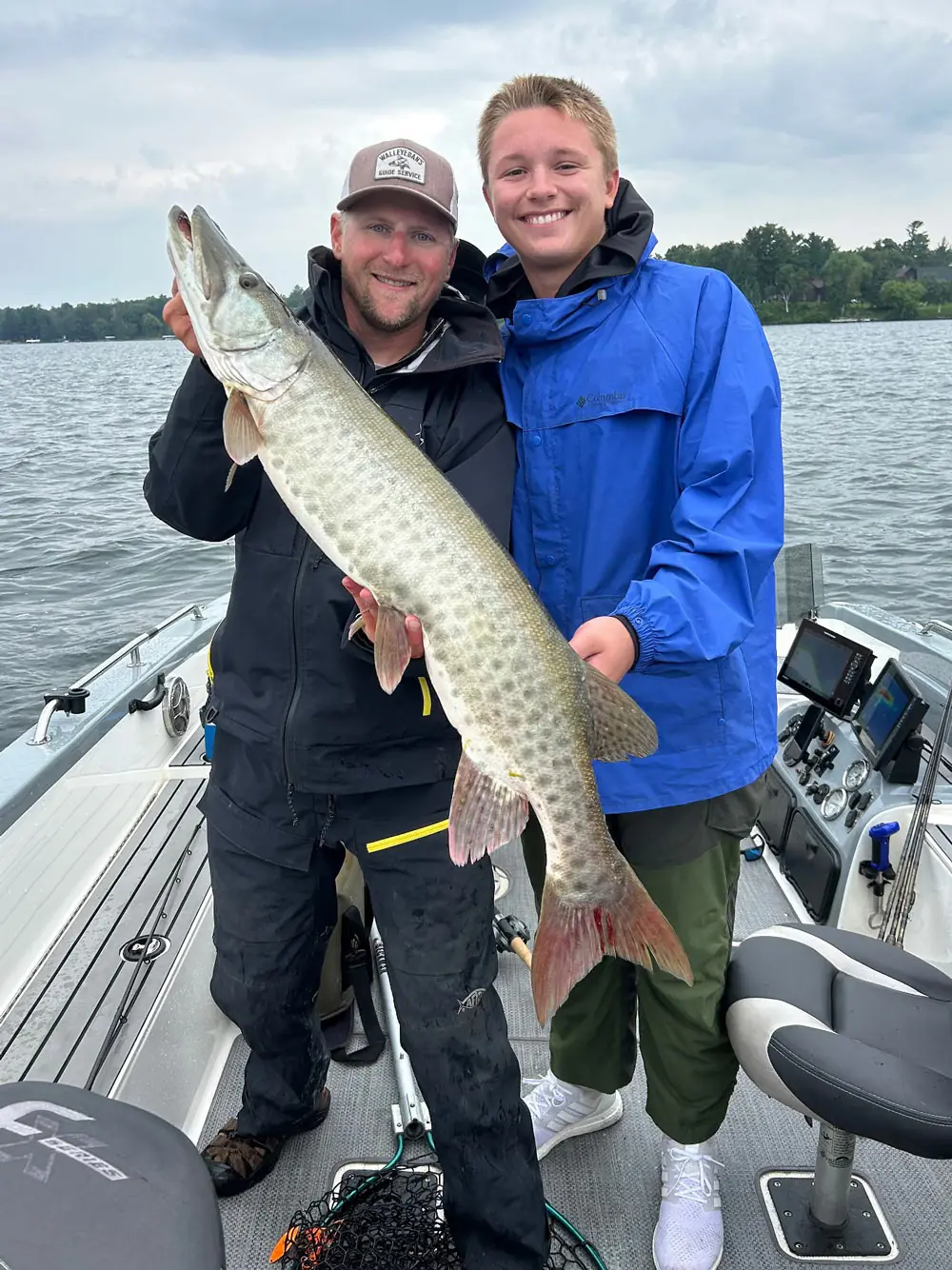 dad-and-son-with-fish-2-walleyedan-fishing-guide-service