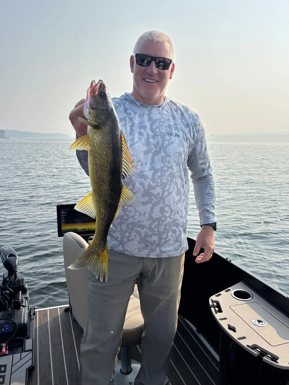 man-with-fish-walleyedan-fishing-guide-service